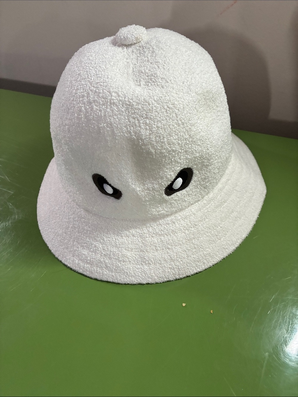 Kangol White Plush Bucket Hat with Cute Eye Appliqué